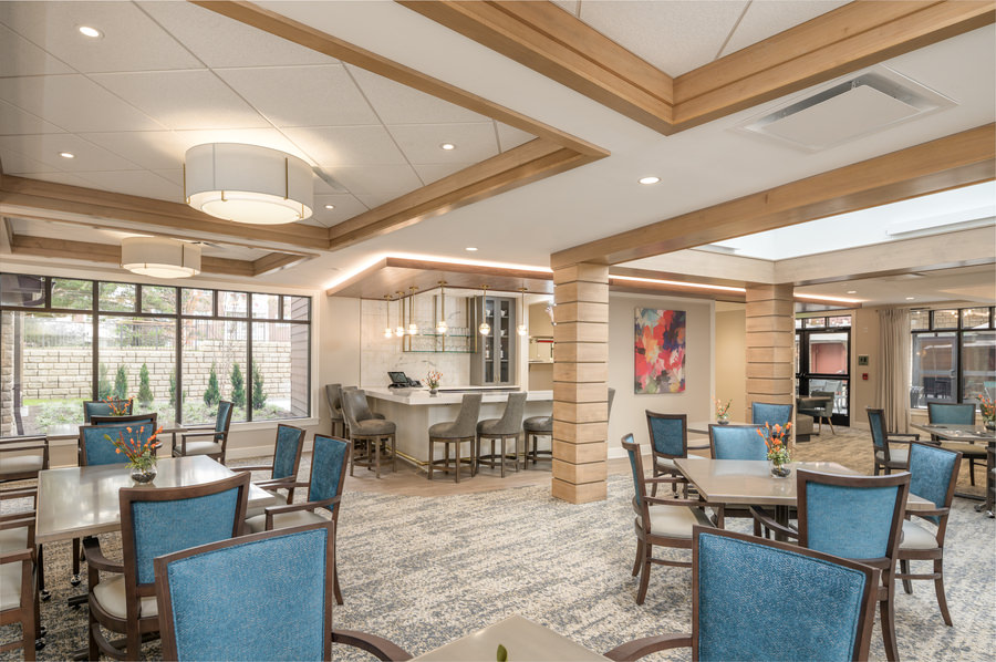 Interior image of bistro/restaurant in a senior living apartment complex