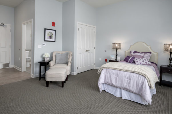 Apartment interior showing bedroom and bathroom